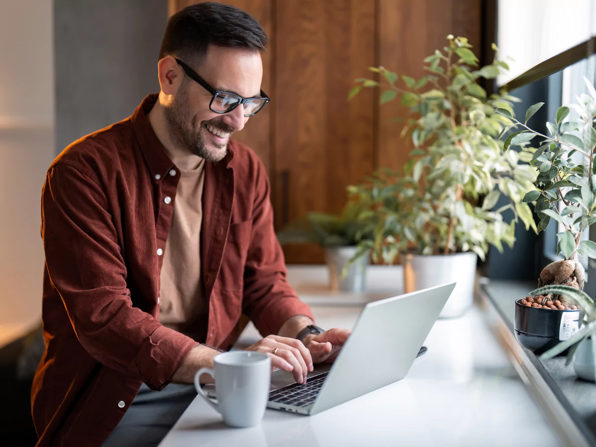 A professional engaging with AIM's Immersive Online Learning Series on a device